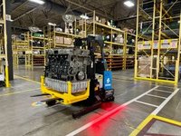 Seegrid Lift RS1 AMR carrying heavy payload in manufacturing facility