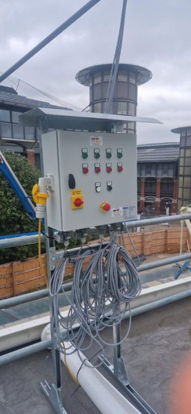 Hoist & Winch also provided 3 separate free-standing control stations of bespoke design to manage hoist unit motion, either individually or in sets of four hoists, during lowering of the original fabric roof and lifting of its replacement.